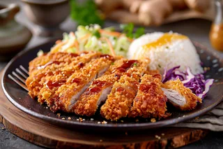 Paniertes Schweineschnitzel mit Krautsalat